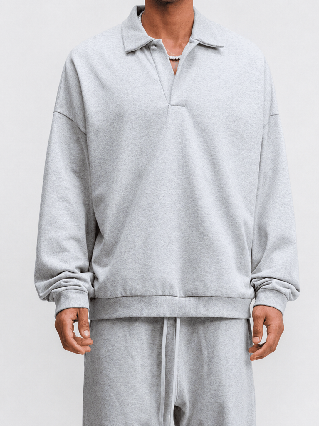Felpa oversize con colletto polo e abbottonatura parziale